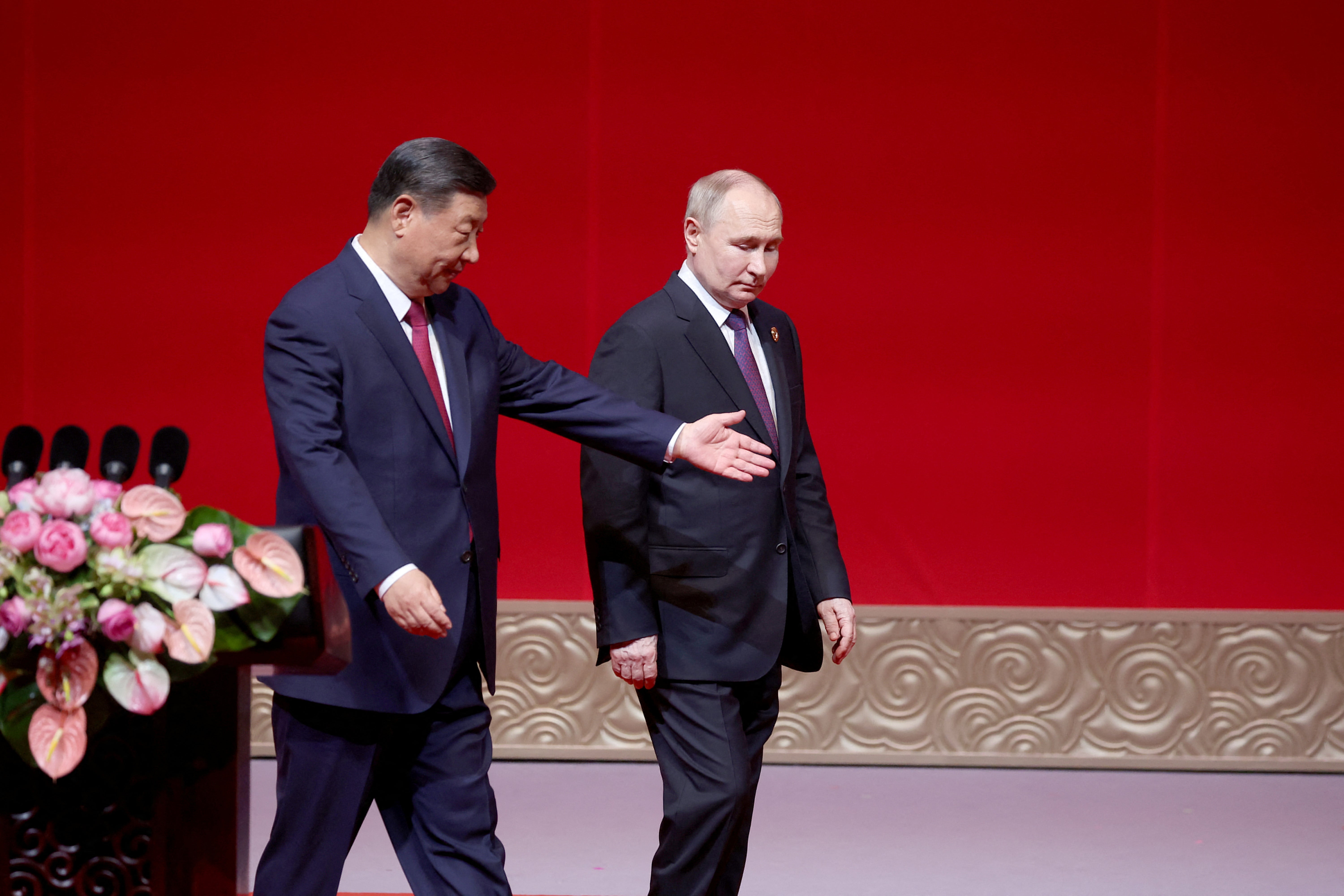 Vladimir Putin and Xi Jinping attend the gala celebration of 75 years of diplomatic relations