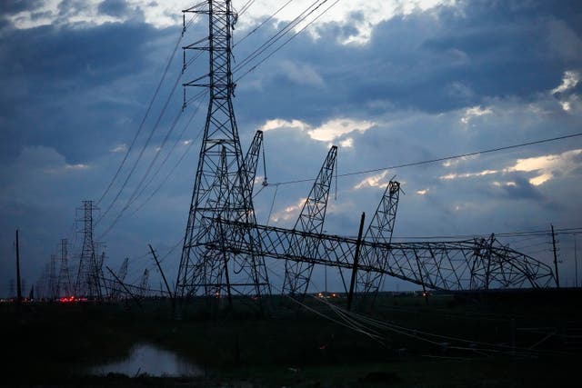 <p>Transmission power lines are down near the Grand Parkway and West Road after a storm  </p>