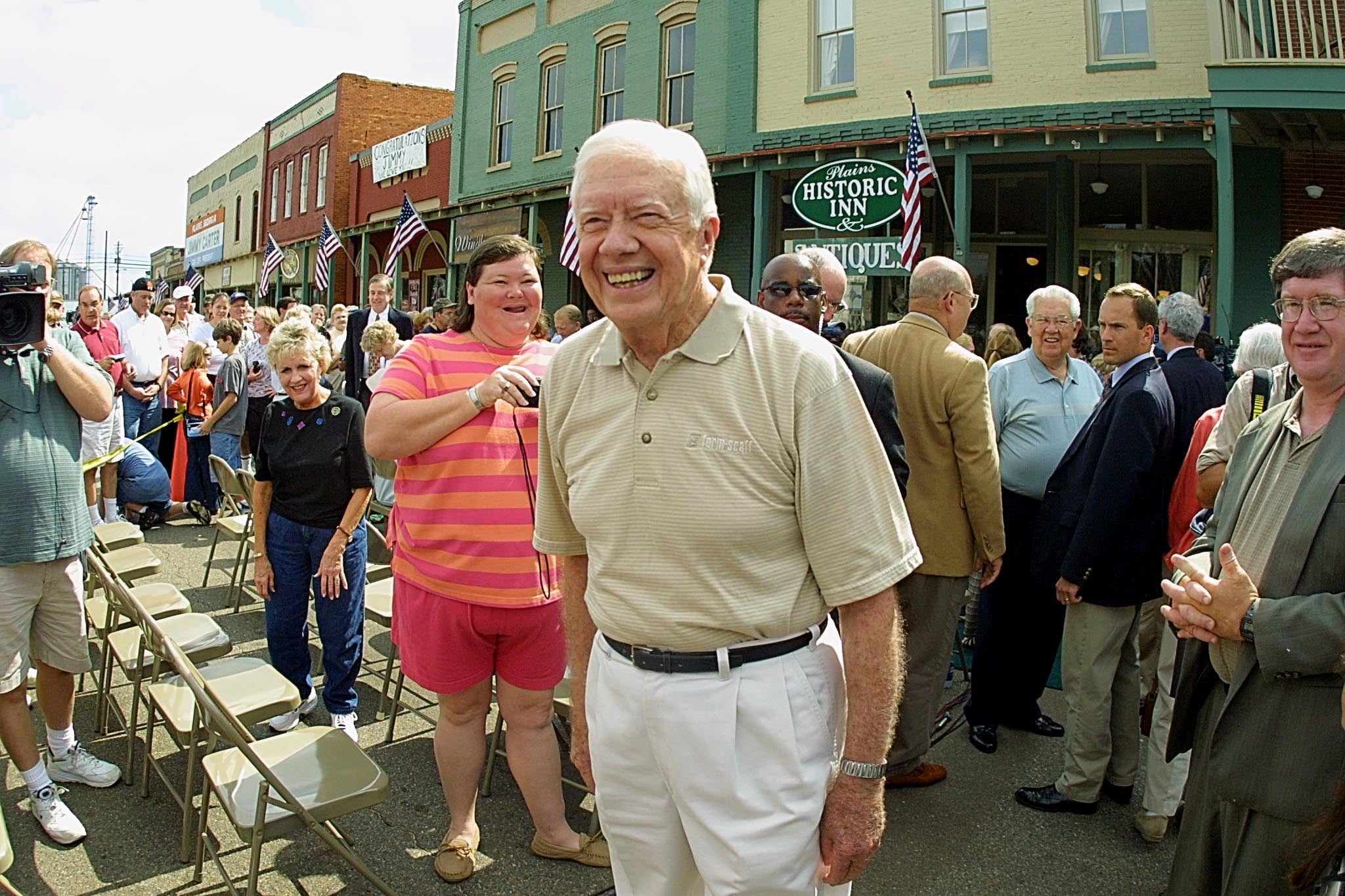 Carter wanders through the crowd after a press conference where he talked about receiving the Noble Peace Prize on 11 October, 2002 in Plains