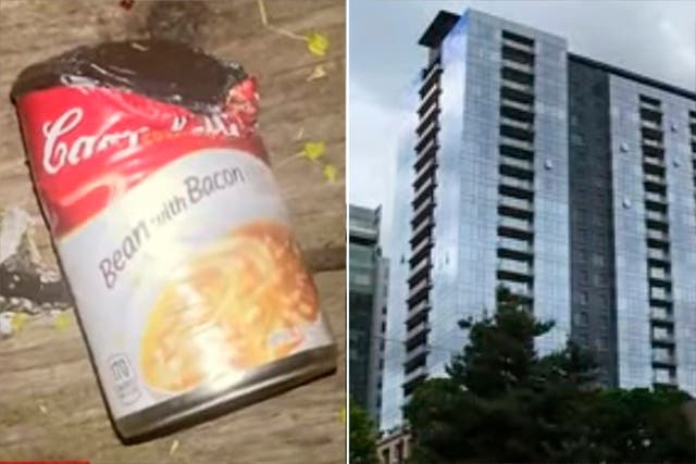 <p>Tins of food are being hurled off a highrise in Downtown Portland </p>