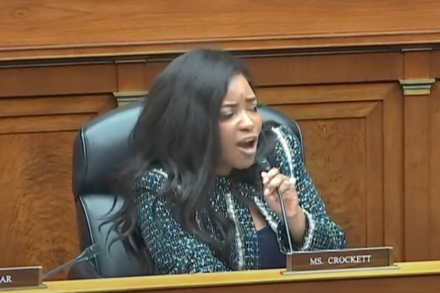 <p>Representative Jasmine Crockett, pictured at the House Oversight Committee hearing on Thursday, called Marjorie Taylor Greene a ‘bleach blond bad-built butch body’ </p>