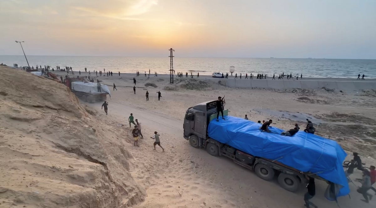 Israeli military footage claims to show Gaza aid being transferred from US floating pier