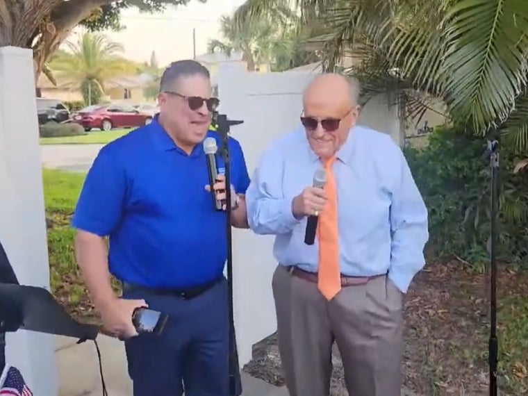 Rudy Giuliani sings 'New York, New York' at his birthday party in Palm Beach this past weekend. He was later served an indictment