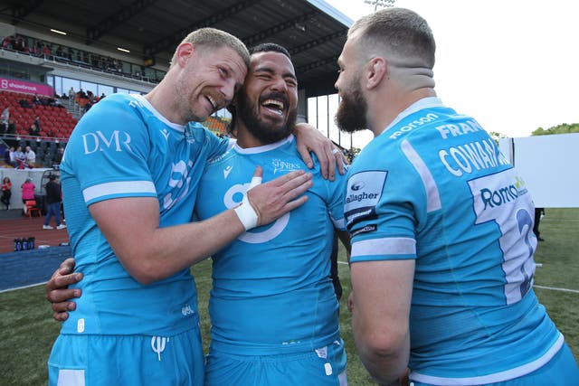 <p>Rob du Preez, Manu Tuilagi and Luke Cowan-Dickie of Sale Sharks celebrate after the Gallagher Premiership Rugby match with Saracens</p>