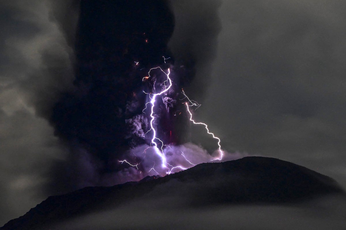 Indonesia’s Mount Ibu volcano eruption shoots grey ash clouds into sky