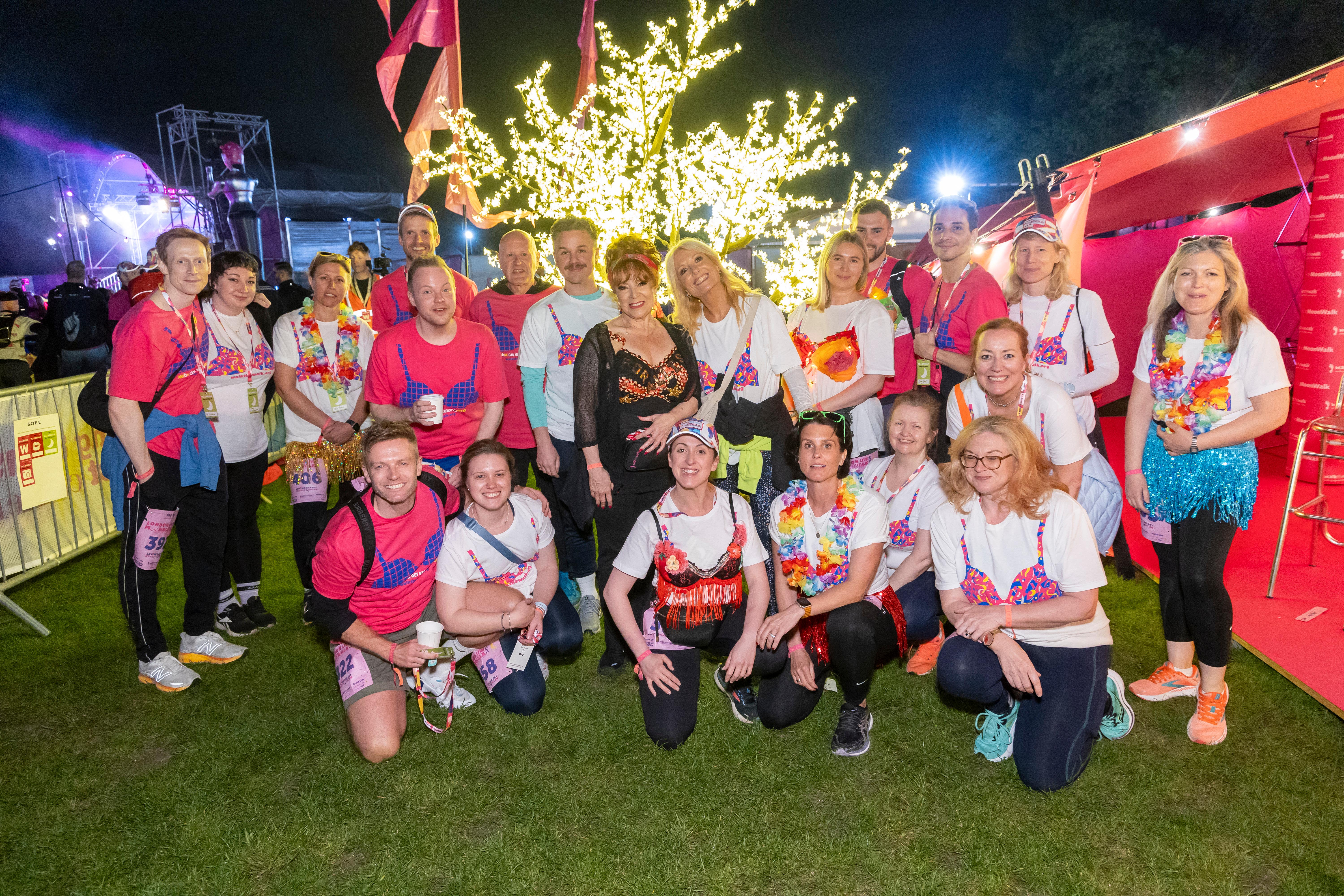 Harriet Thorpe (middle) was joined by David Ames (middle left), Gaby Roslin (middle right), Natalie Cassidy (front) and Heather Pearce (front left) for an annual walk to raise money for breast cancer charity Walk The Walk (Walk The Walk/PA)