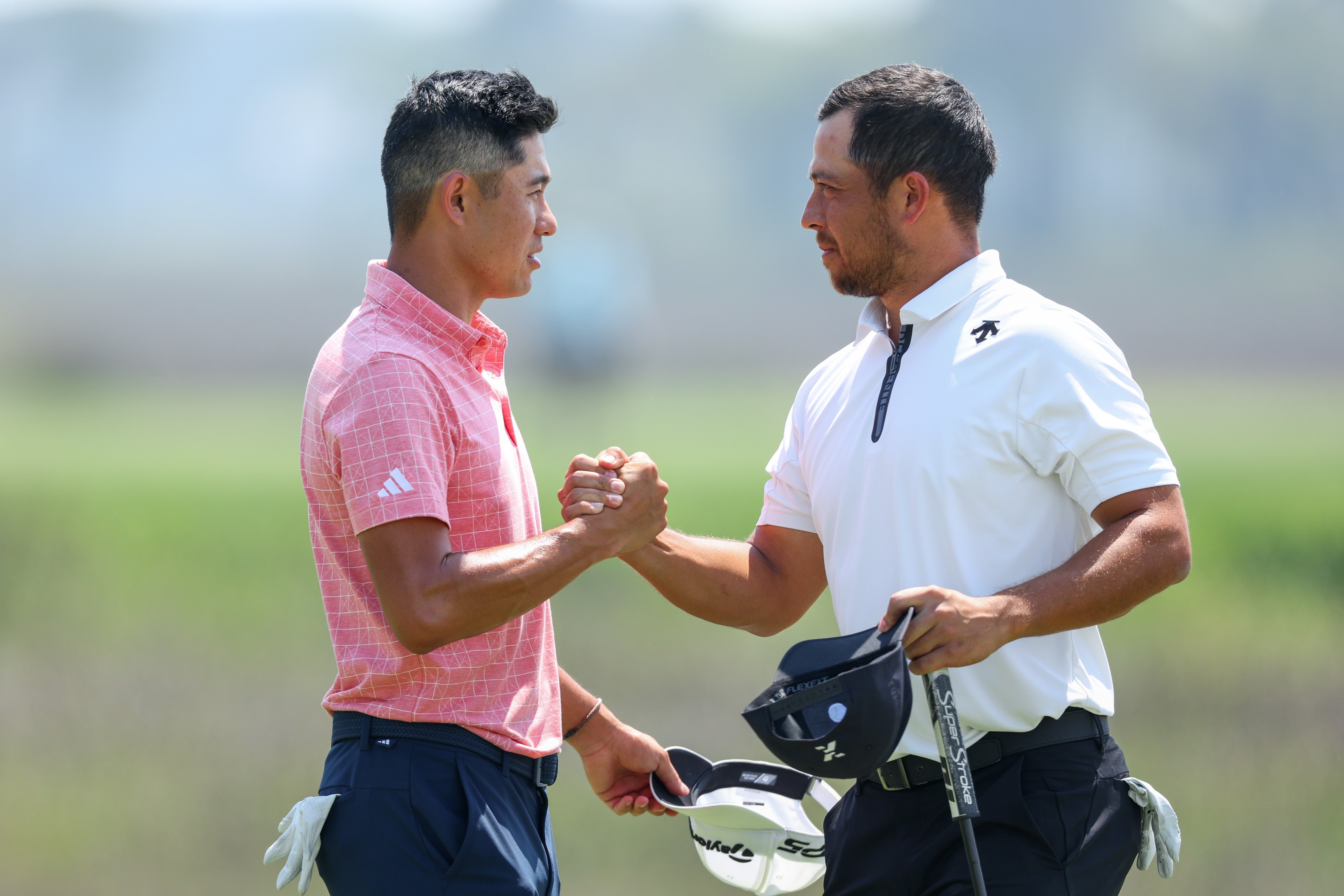 Xander Schauffele and Collin Morikawa hold a share of the lead