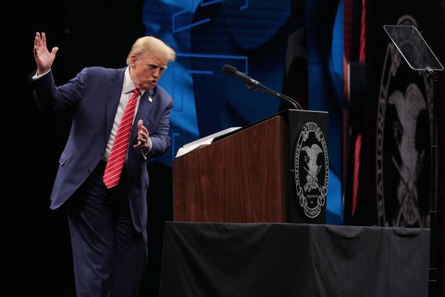 <p>Former President and Republican presidential candidate Donald Trump delivers a speech during the annual National Rifle Association meeting in Dallas on 18 May</p>