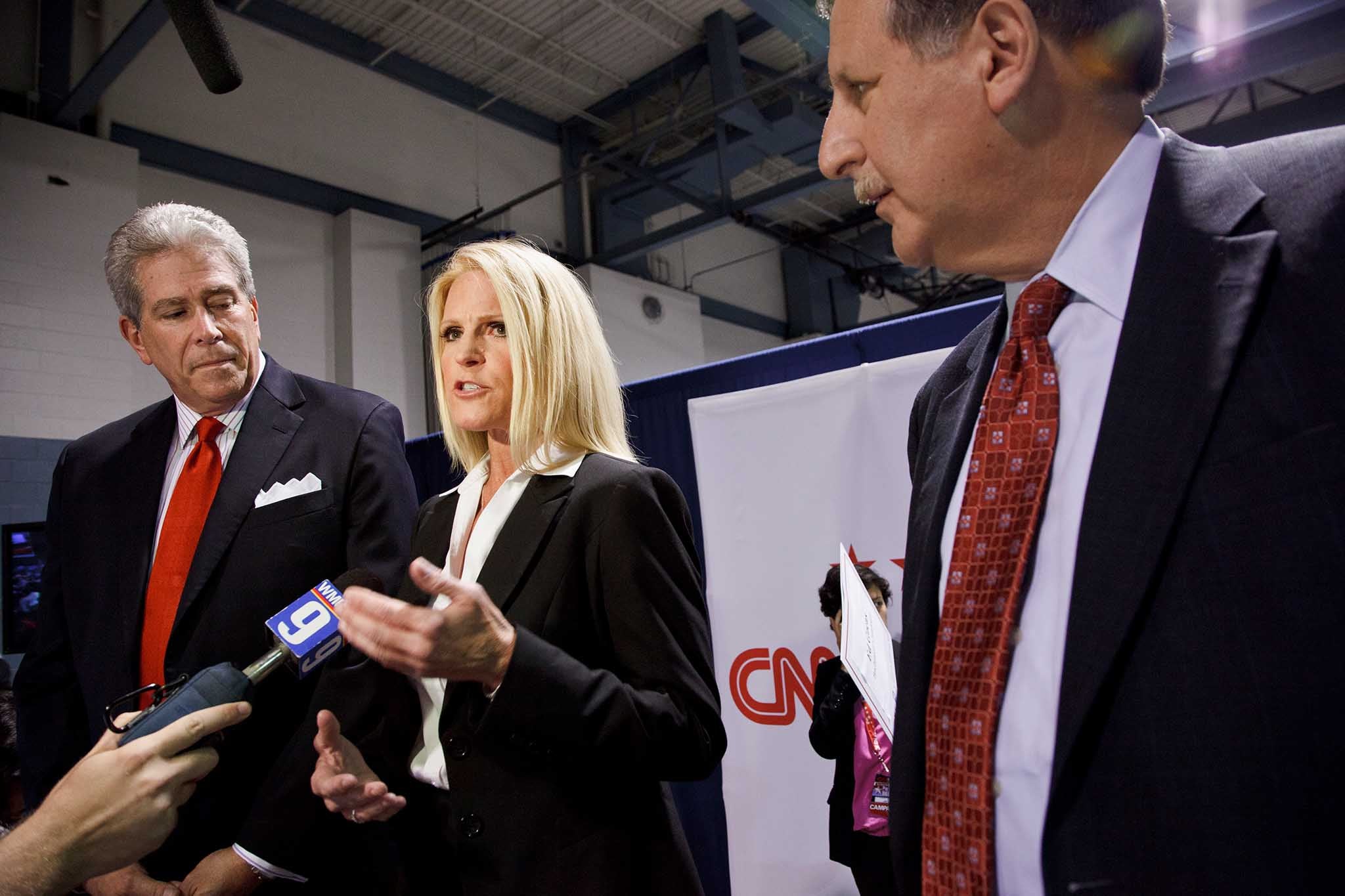 Alice Stewart (center) with Ed Goeas (left) and Bob Heckman (right) in the spin room after The New Hampshire Republican debate in 2012 when she served as Michele Bachmann’s press secretary
