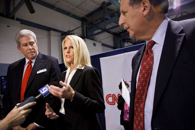 <p>Alice Stewart (center) with Ed Goeas (left) and Bob Heckman (right) in the spin room after The New Hampshire Republican debate in 2012 when she served as Michele Bachmann’s press secretary </p>