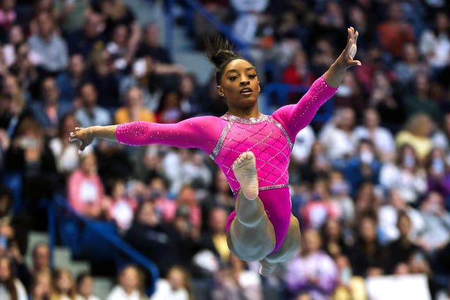 <p>US gymnast Simone Biles competes in the floor event during the Core Hydration Classic at XL Center in Hartford, Connecticut </p>