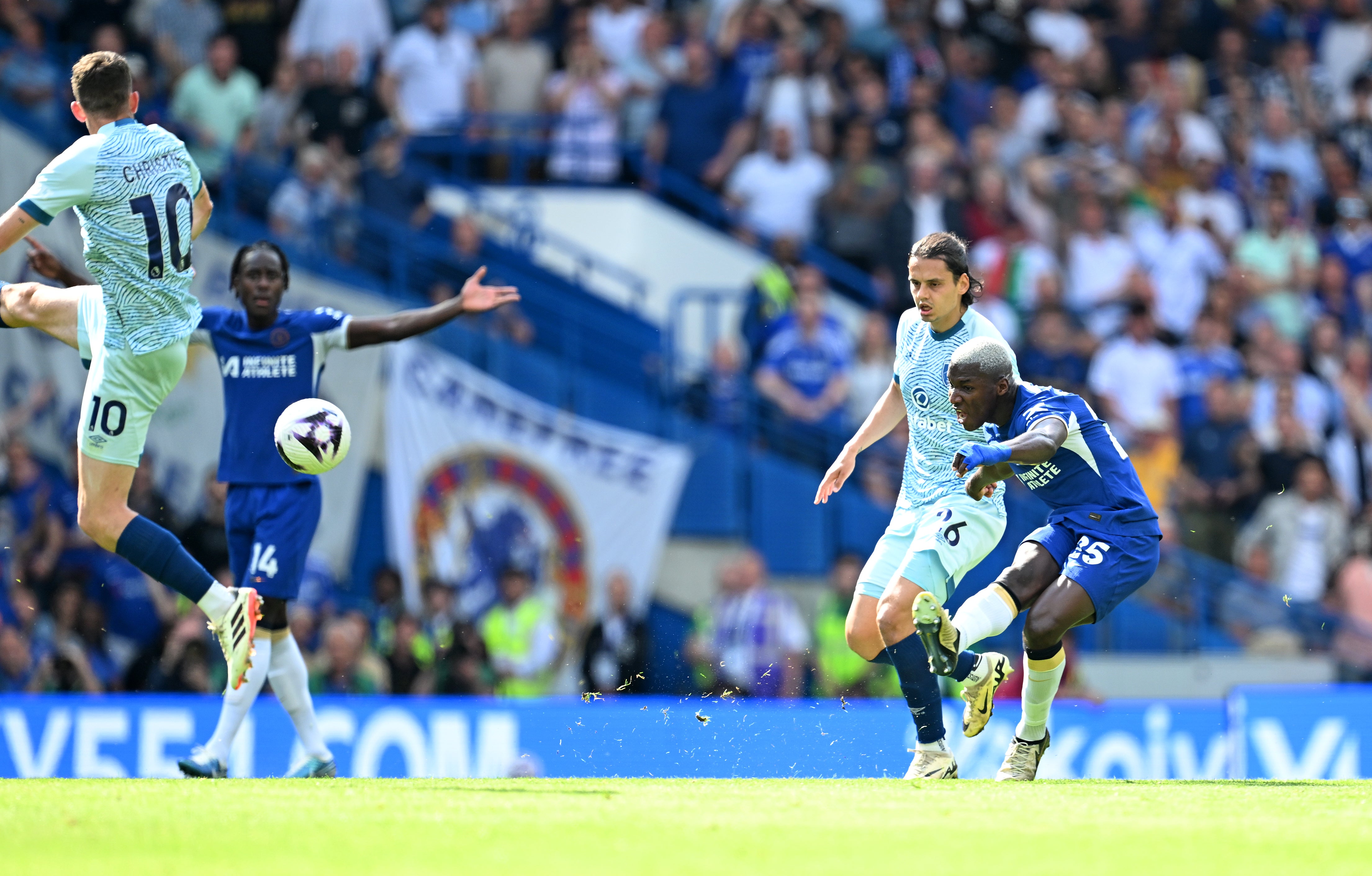 Moises Caicedo fires at goal from the halfway line