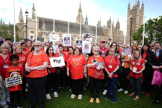 <p>Infected blood campaigners met on Parliament Square (Aaron Chown/PA)</p>