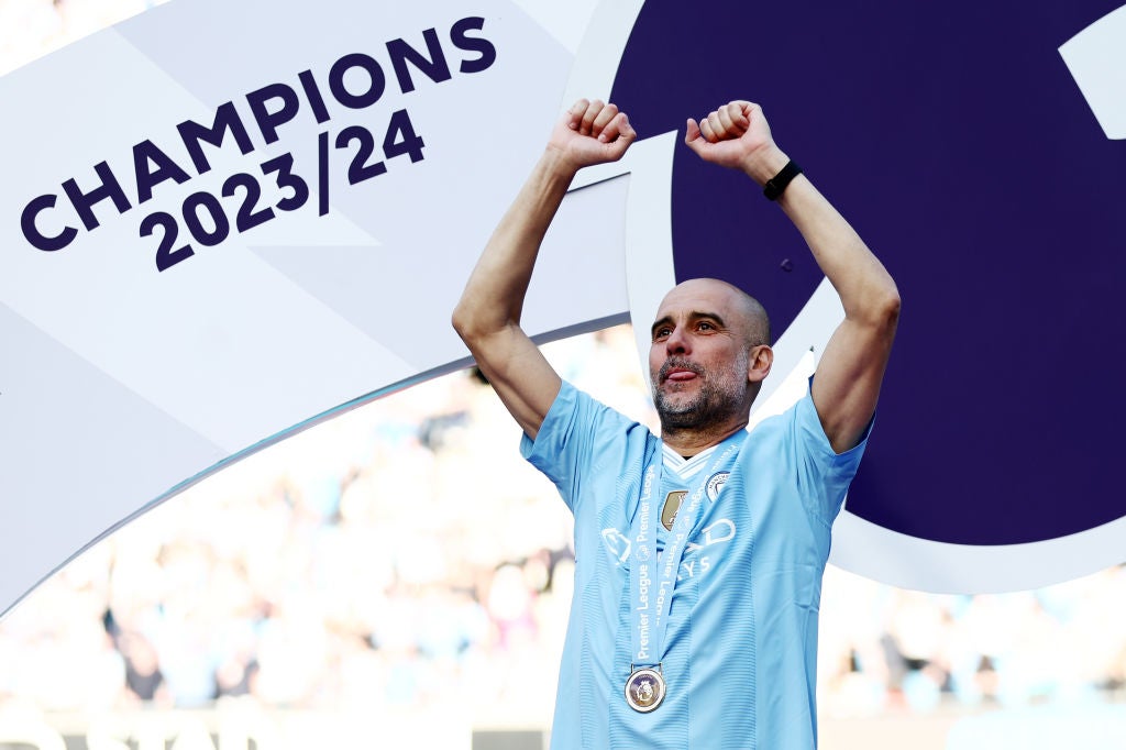 Guardiola celebrates as his team win their fourth Premier League title in a row