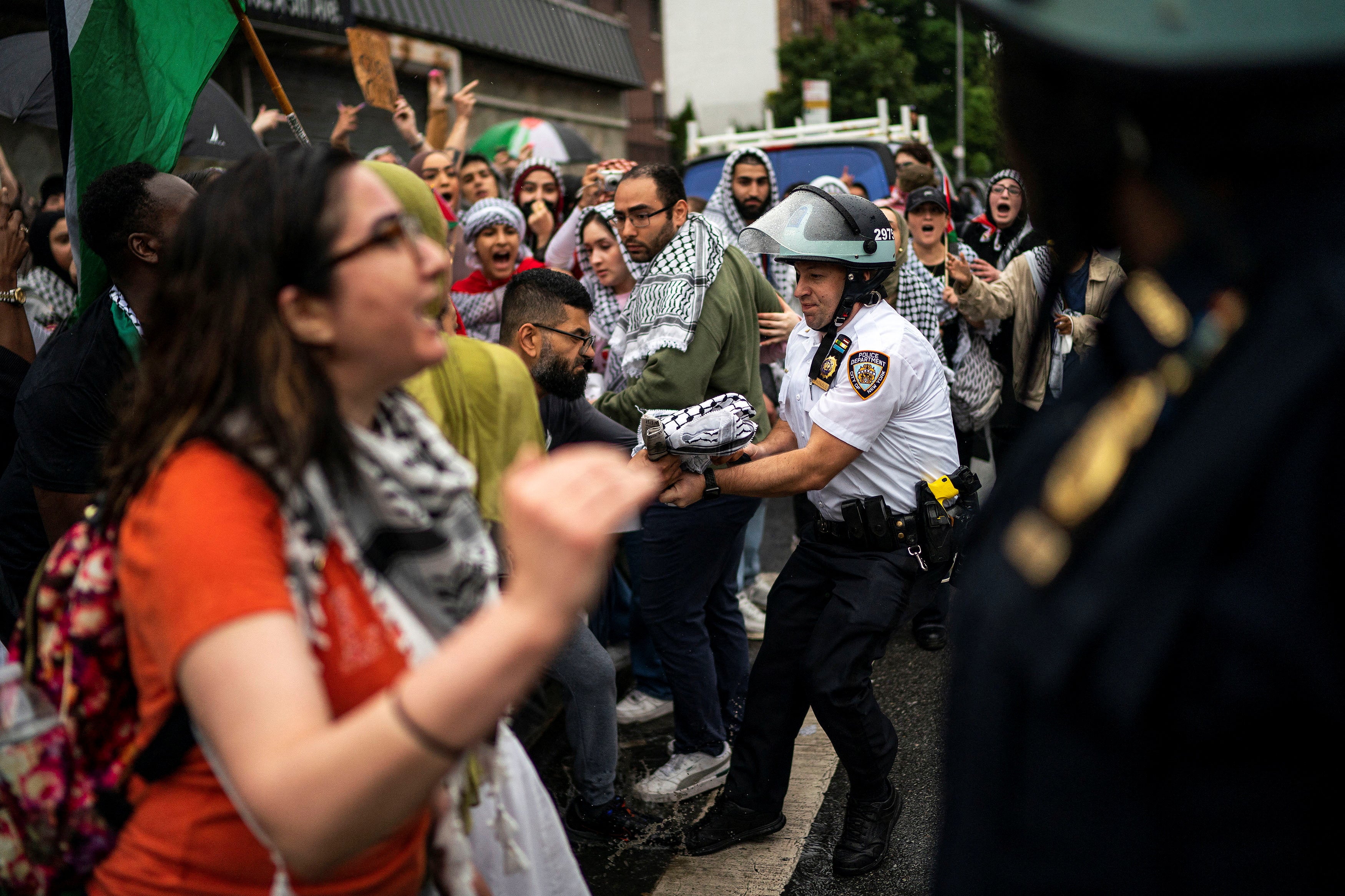 Police and anti-war protesters clash in Brooklyn, New York during a demonstration on 18 May organised for the 76th anniversary of the Nabka