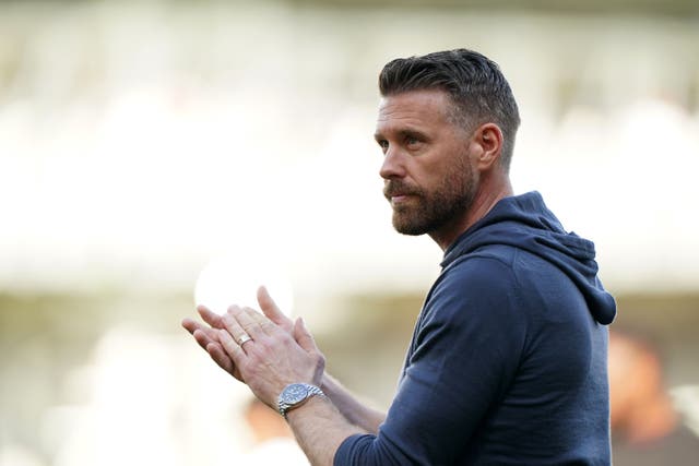 Rob Edwards applauds the Luton fans following the match (Joe Giddens/PA)