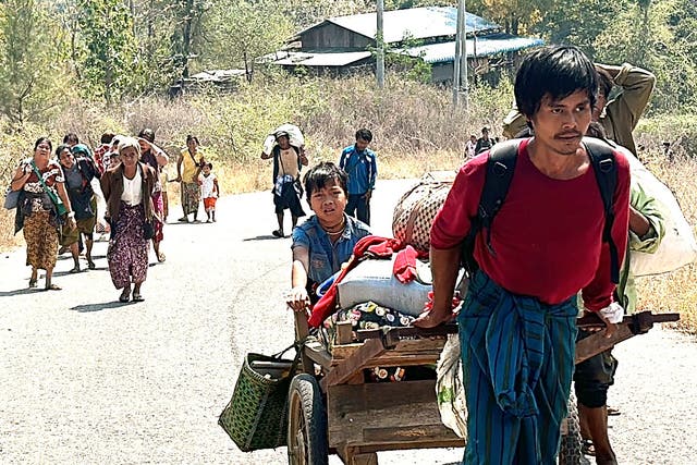 <p>People flee the fighting in Pasaung area in Myanmar’s Karenni state on 1 March 2024</p>