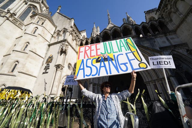 <p>Supporters of Julian Assange outside the Royal Courts of Justice in London, ahead of the latest stage of his US extradition legal battle (Lucy North/PA)</p>