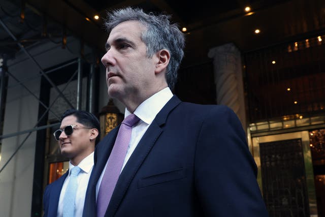 <p>Michael Cohen leaves his apartment to testify in Donald Trump’s hush money trial in Manhattan on May 20</p>