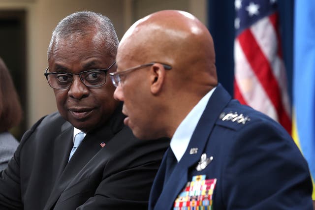<p>U.S. Secretary of Defense Lloyd Austin (L) and Chairman of the Joint Chiefs of Staff General Charles Q. Brown Jr. participate in a virtual meeting of the Ukraine Defense Contact Group at the Pentagon on May 20, 2024 in Arlington, Virginia</p>
