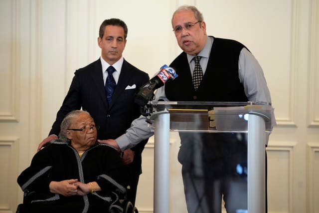 <p>Sam Lemon, right, speaks during a news conference with Susie Williams Carter, center, and lawyer Michael Pomerantz, Monday, 20 May 2024, in Philadelphia</p>