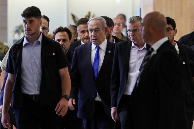 <p>Israeli prime minister Benjamin Netanyahu arrives at his Likud party faction meeting at the Knesset, Israel’s parliament, after the ICC motion was made public </p>