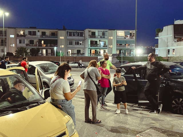 <p>People gather in a street after an earthquake in Campi Flegrei, near Naples, Italy, Tuesday, May 20, 2024</p>