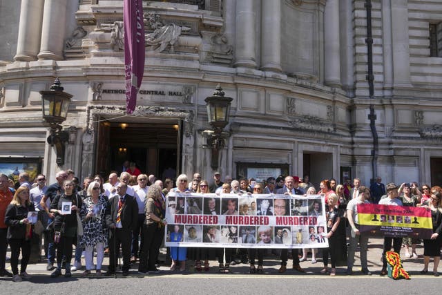 Victims and campaigners outside Central Hall in Westminster, London, after the publication of the Infected Blood Inquiry report (Jeff Moore/PA)