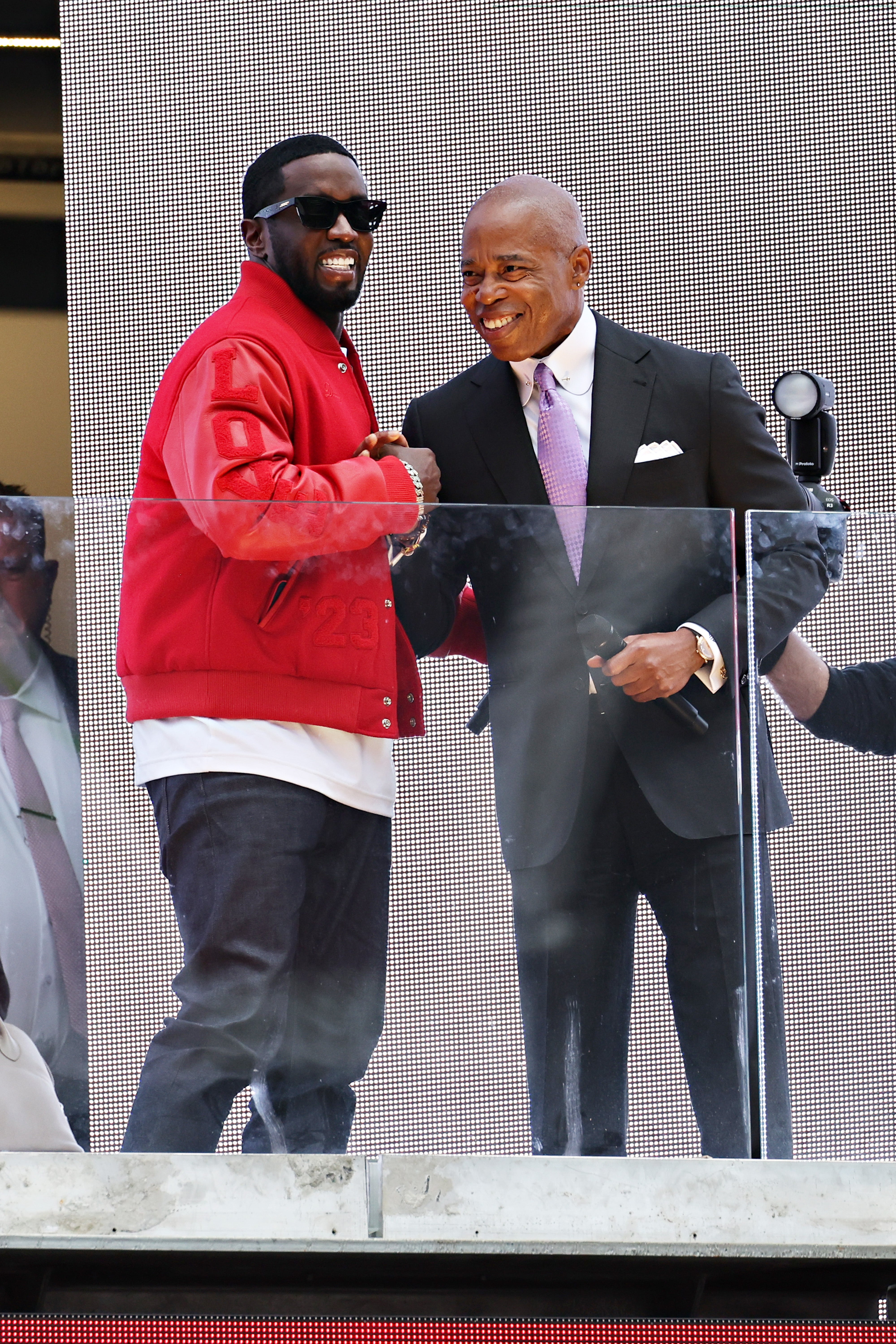 New York Mayor Eric Adams presents Sean ‘Diddy’ Combs with the keys to the city in Times Square on September 15, 2023 in New York City