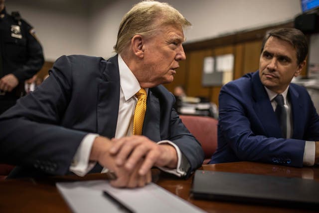 <p>Former President Donald Trump sits in a courtroom next to his lawyer Todd Blanche shortly before the defense rests case in historic criminal trial </p>