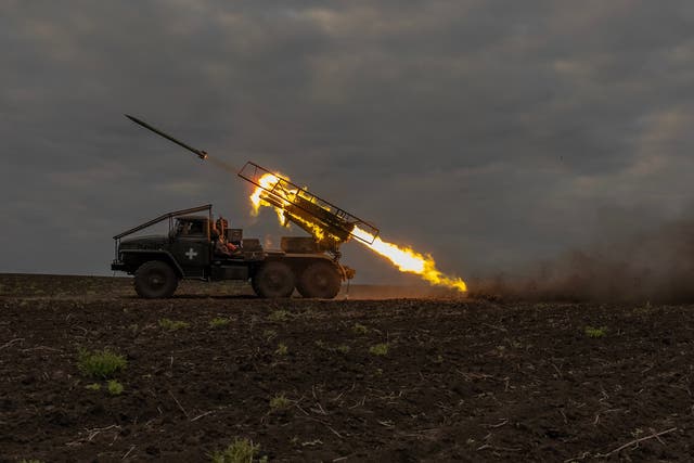 <p>Ukrainian servicemen of the 92nd Assault Brigade fire BM-21 'Grad' multiple rocket launcher toward Russian positions, in the Kharkiv region</p>