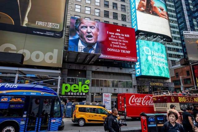 <p>A billboard displaying Donald Trump’s boastful remarks about his responsibility for overturning Roe vs Wade is displayed in Times Square</p>