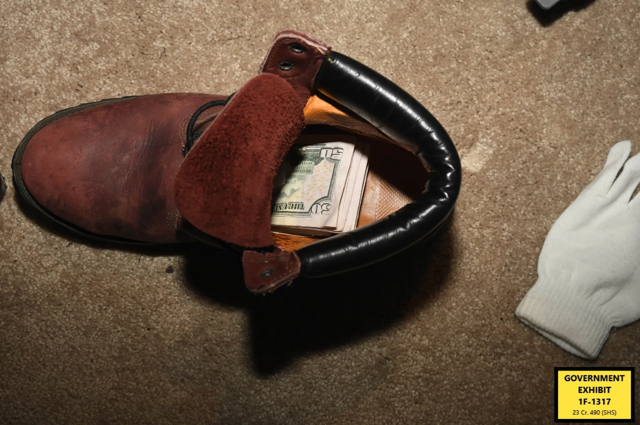 Cash was found in various places in the home, including a work Timberland brand work boot