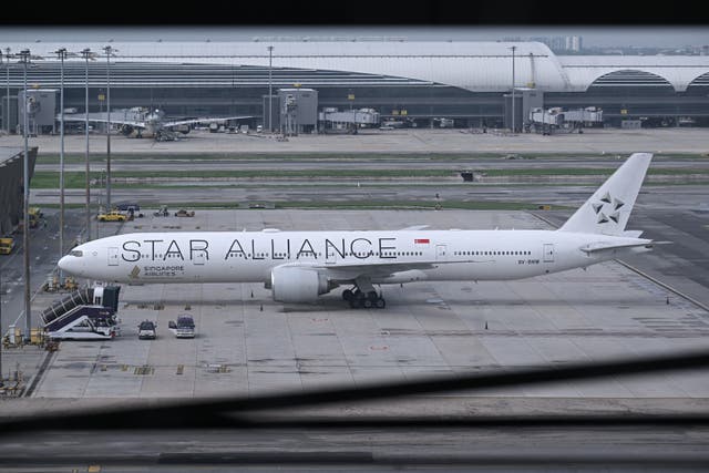 <p>Singapore Airlines flight SQ321, which was headed to Singapore from London before making an emergency landing in Bangkok due to severe turbulence, is seen on the tarmac at the Suvarnabhumi International Airport in Bangkok on 22 May 2024</p>
