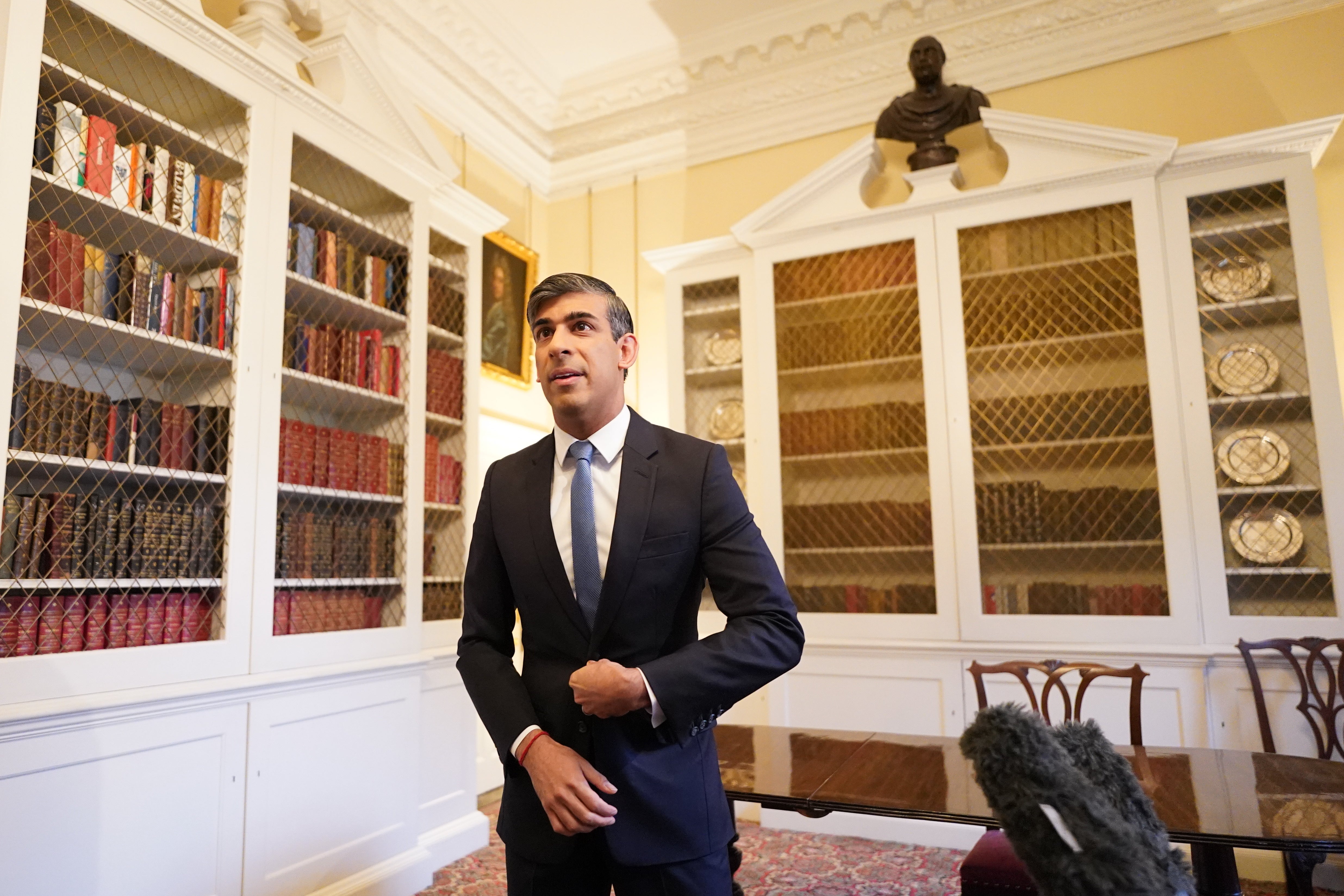 Rishi Sunak in Downing Street after giving a statement about inflation