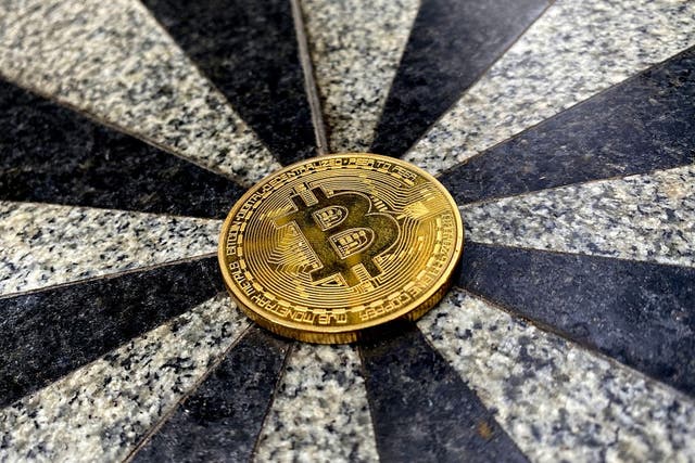 <p>A visual representation of bitcoin cryptocurrency is pictured on 30 May, 2021 in London, England</p>