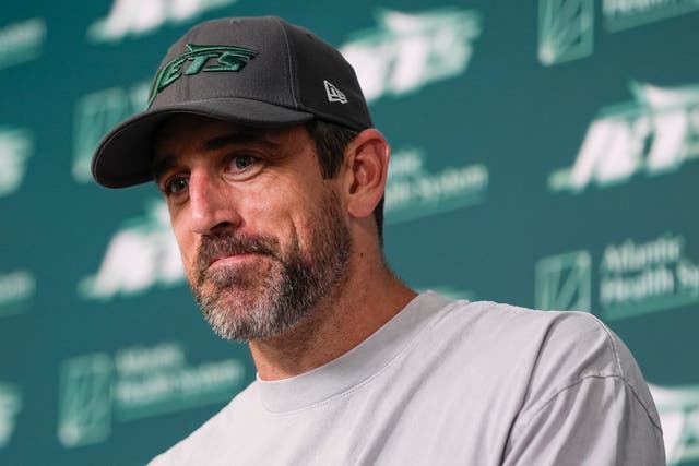 <p>New York Jets quarterback Aaron Rodgers talks to reporters after a practice at the NFL football team's training facility in Florham Park, N.J., Tuesday, May 21, 2024.</p>
