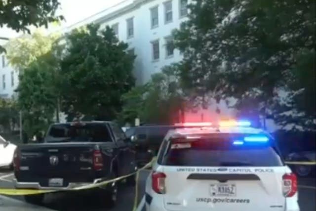 <p>Law enforcement on the scene of the Republican National Committee headquarters after it was plunged into lockdown </p>