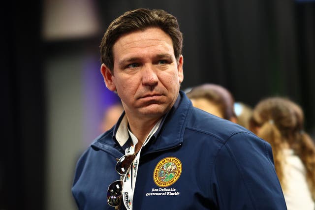 <p>Ron DeSantis, pictured, signed a series of bills that repeal climate change policies and remove climate references from state law.  A local meteorologist has pushed back </p>