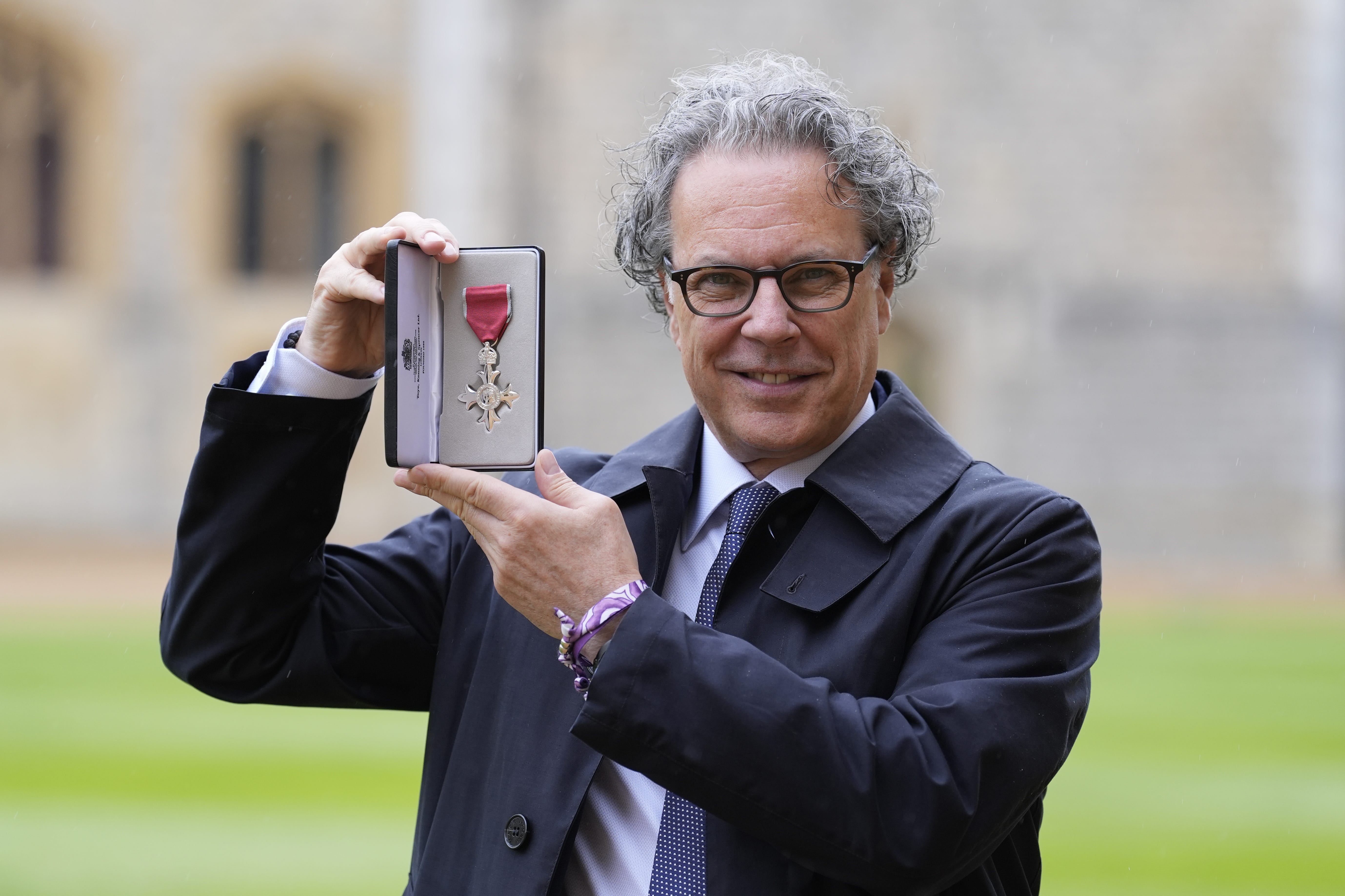 Ian Russell was made a Member of the Order of the British Empire by the Prince of Wales at Windsor Castle (Andrew Matthews/PA)