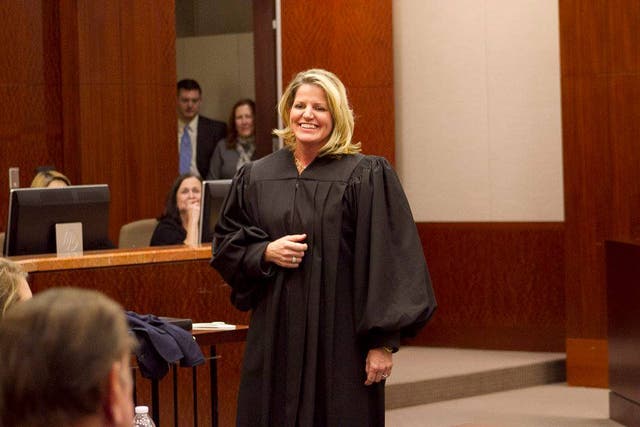 <p>Harris County Kelli Johnson was in a traffic stop on April 12 during a high-profile murder trial </p>