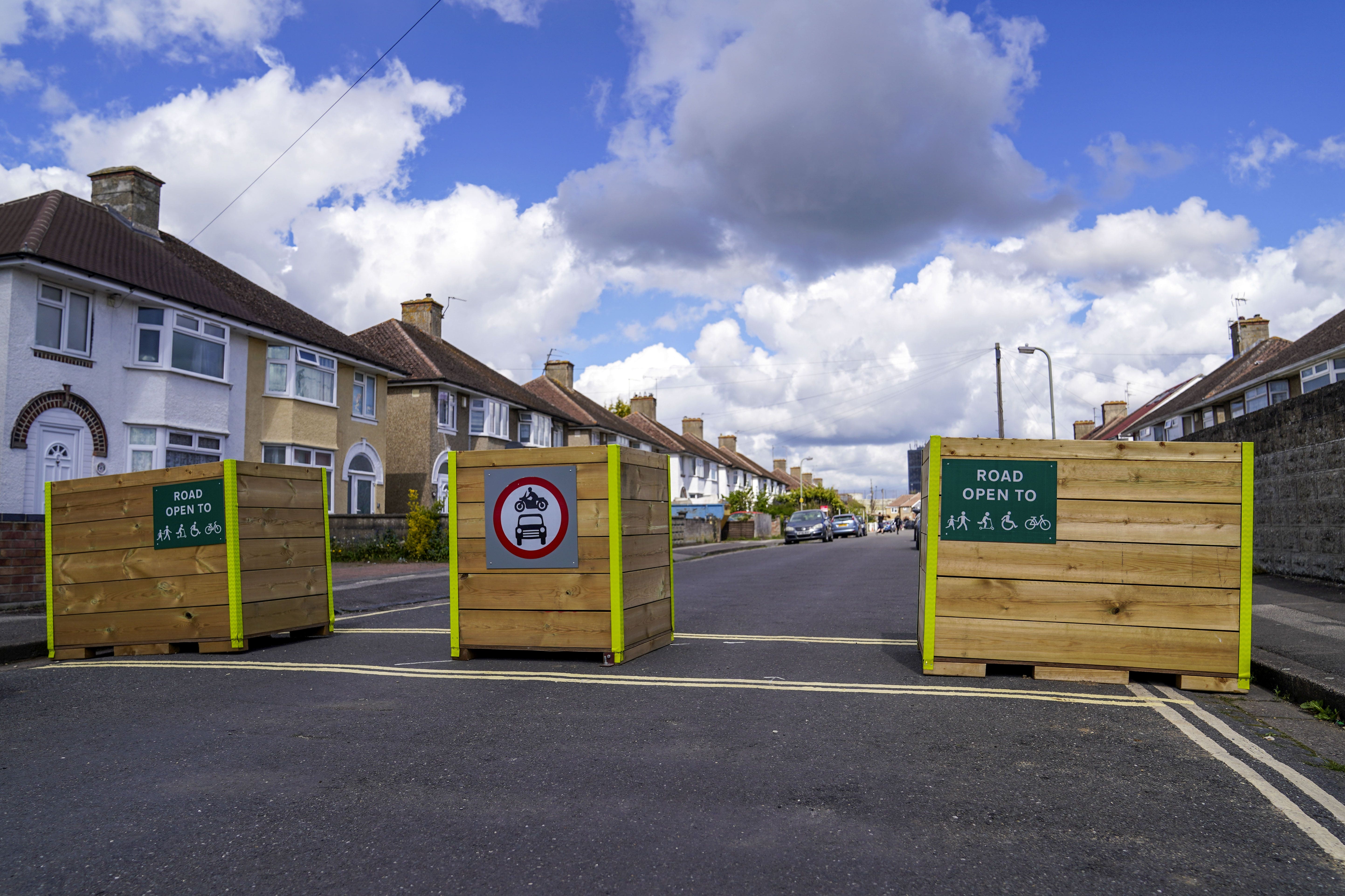 Low traffic neighbourhoods involve preventing vehicles from using some residential streets (Steve Parsons/PA)