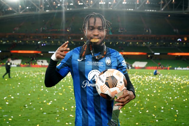 Atalanta’s Ademola Lookman celebrates with the match ball after scoring a hat-trick in the Europa League final (Brian Lawless/PA)