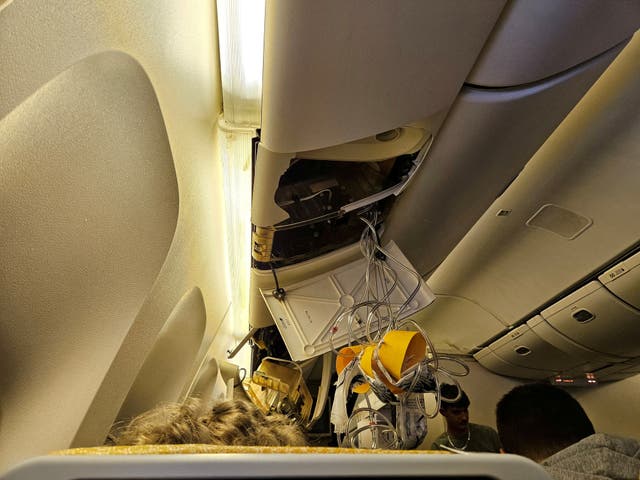 <p>Danger zone: Interior of Singapore Airlines flight SQ321 after its emergency landing at Bangkok</p>