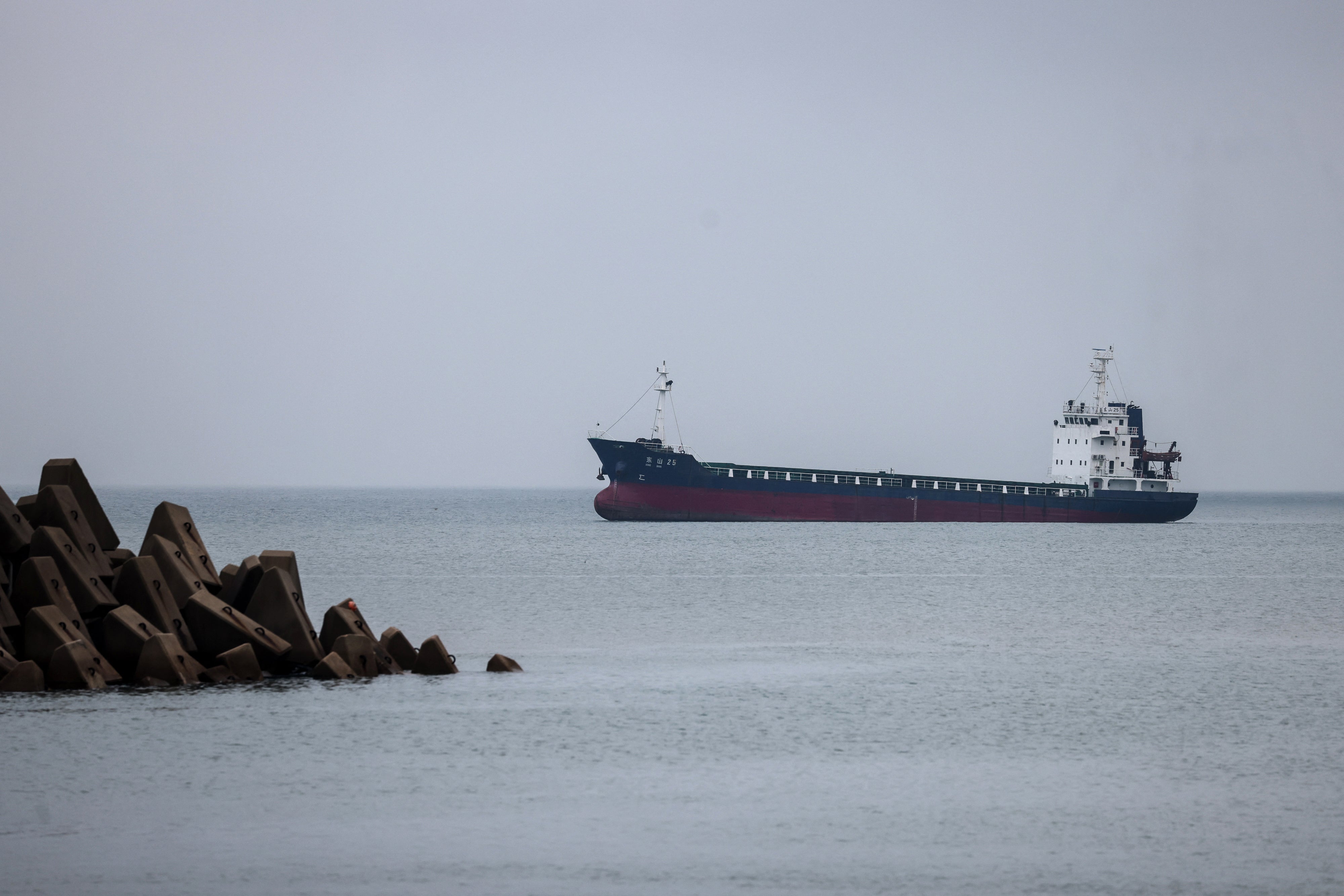 A ship is seen near a fishing port in Taiwan’s Kinmen on 23 May 2024