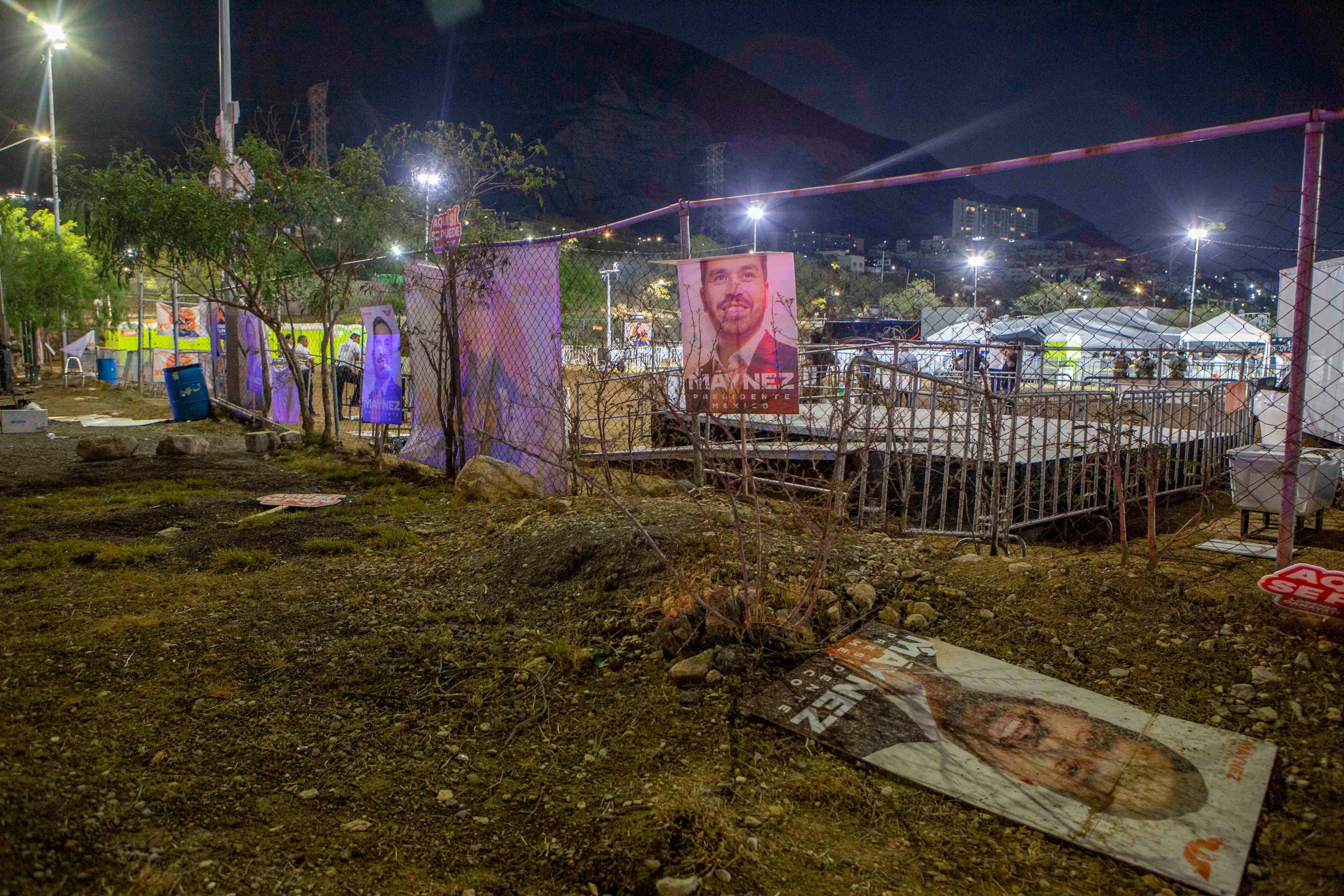 A campaign poster is seen on the ground after a stage collapsed during a campaign rally for Mexican presidential candidate Jorge Alvarez Maynez in San Pedro Garza Garcia, Nuevo Leon