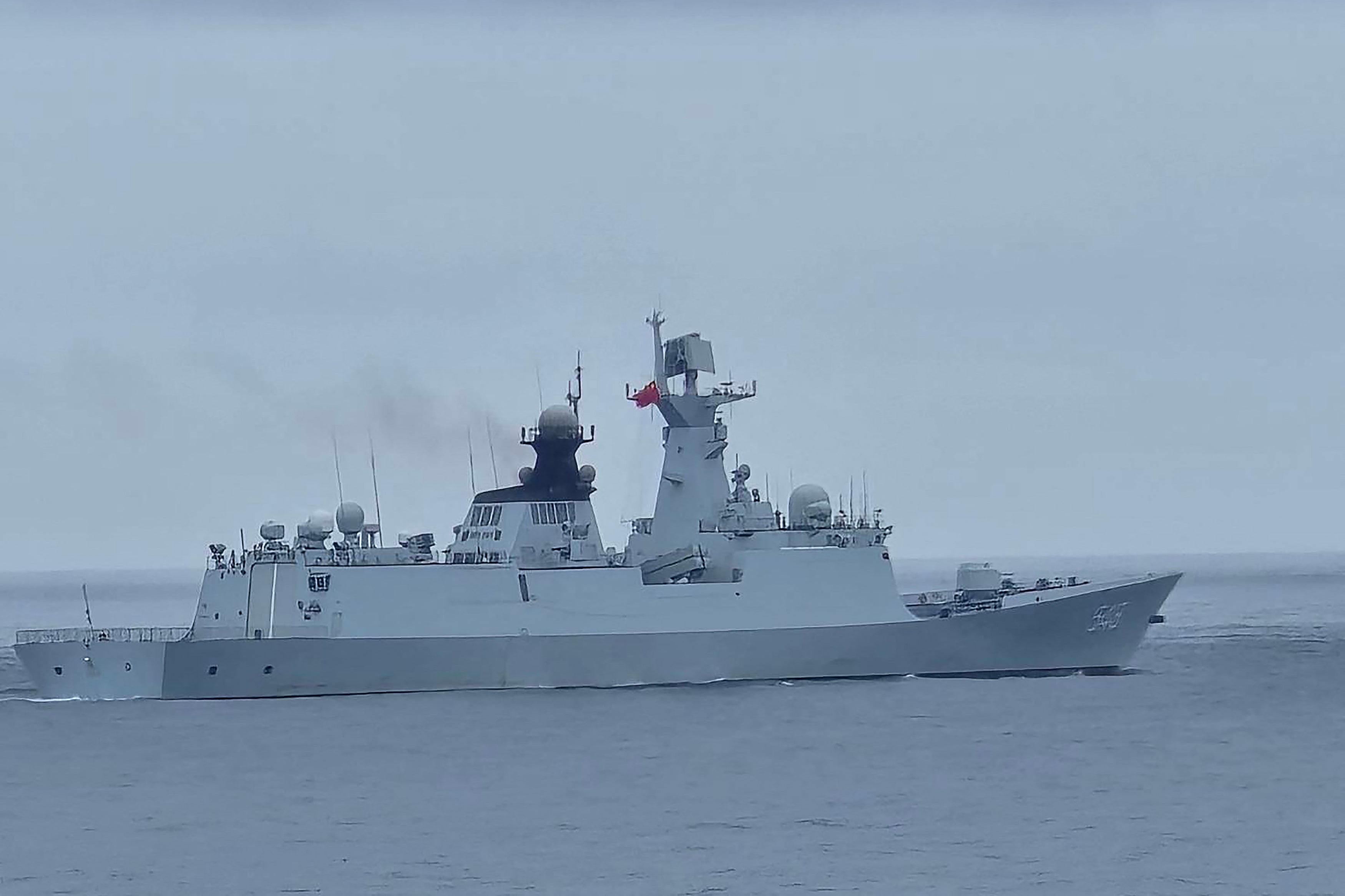 This handout photo taken and released by the Taiwan Coast Guard on May 23, 2024 shows a Chinese military ship northwest of Pengjia Island, off the coast of northern Taiwan. China on 23 May encircled Taiwan with naval vessels and military aircraft in war games aimed at punishing the self-ruled island after its new president vowed to defend democracy