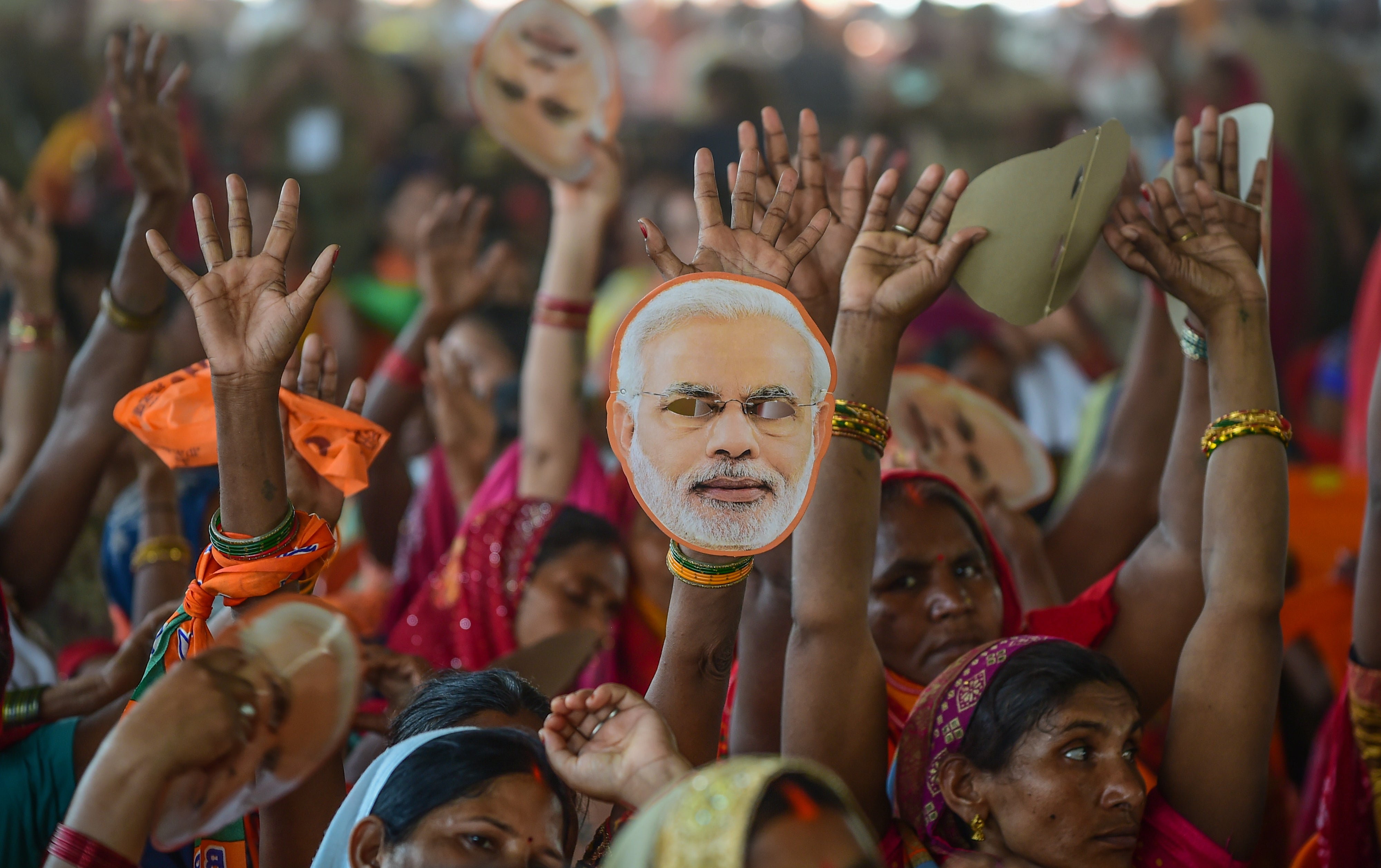 <p>Narendra Modi’s supporters gather to hear the prime minister speak during a rally in Allahabad</p>