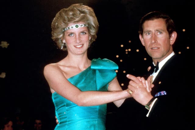 <p>Princess Diana, with Prince Charles, wore a diamond choker necklace as a headband in Australia, in 1985</p>