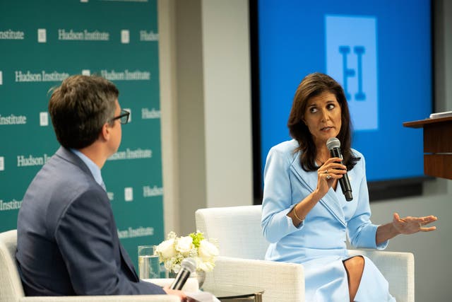 Former U.N. Ambassador Nikki Haley speaks with Peter Rough after speaking at the Hudson Institute on May 22
